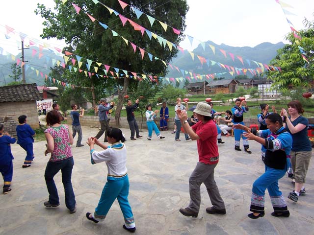 Researchers Learning Traditional Tujia Dancing